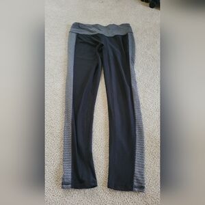 RBX womens medium black gray legging used small hole in 1 leg